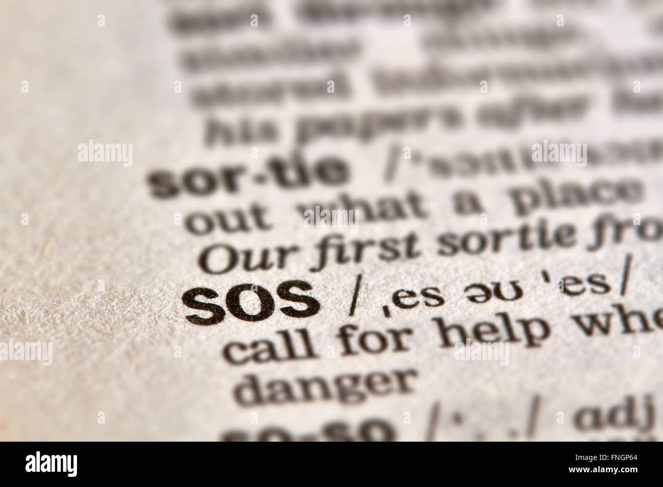 SOS definizione parola di testo nella pagina del dizionario Foto Stock