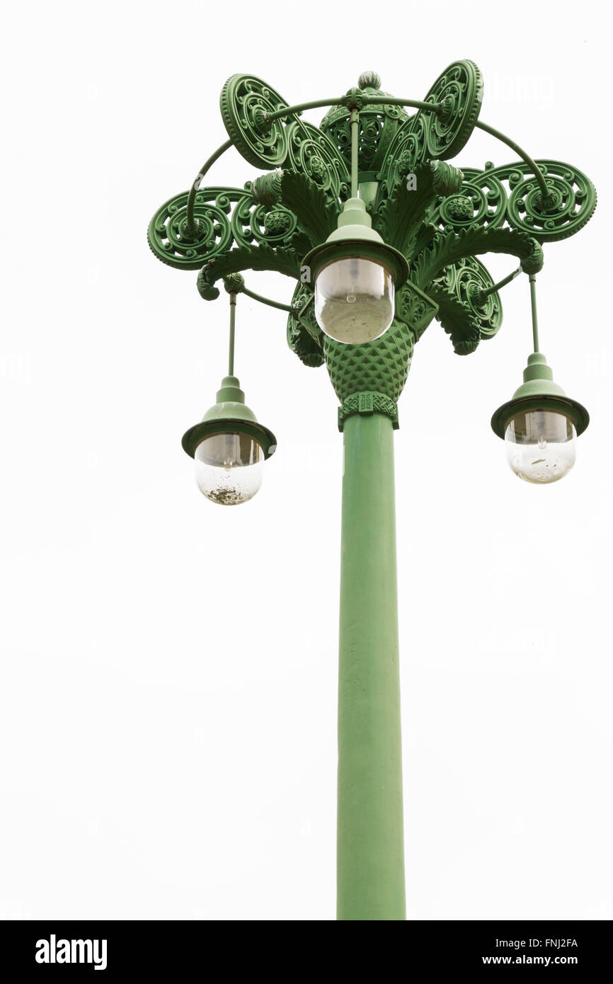 Antico elettrico pilastro con tre plutonomy di vetro Foto Stock