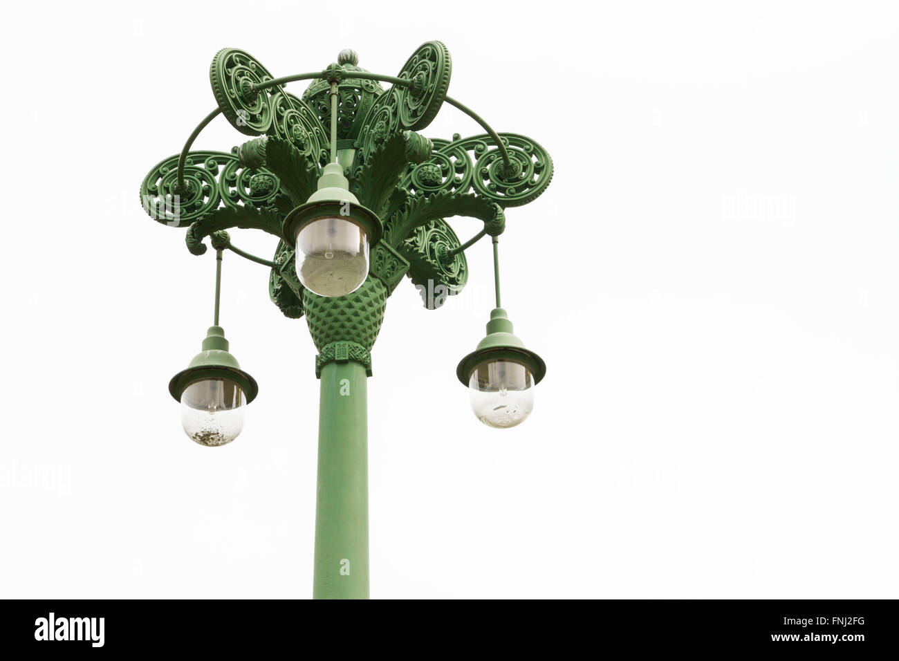 Antico elettrico pilastro con tre plutonomy di vetro Foto Stock