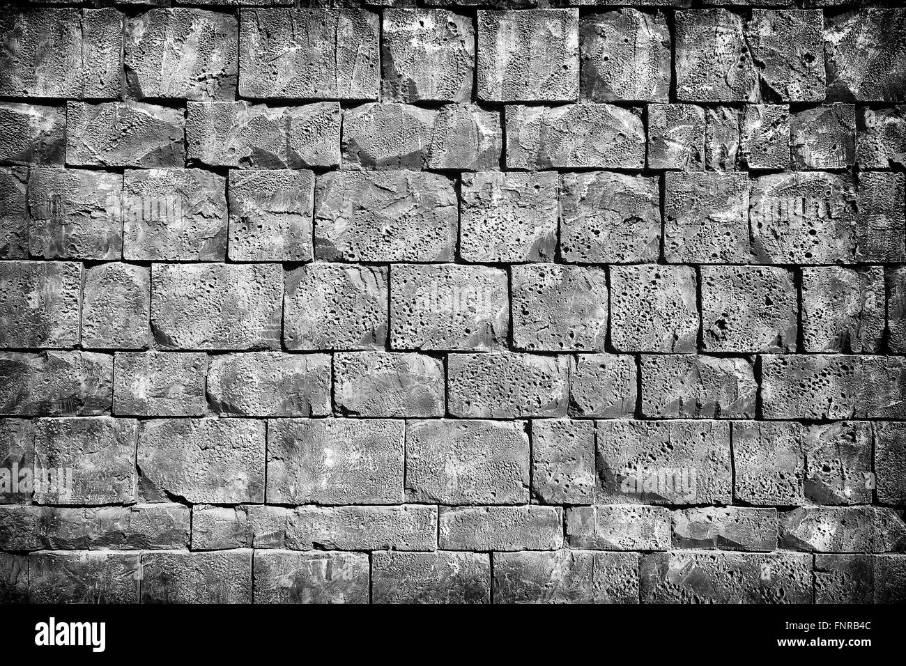 Modello di decorativi in pietra di una superficie di una parete in cemento Foto Stock