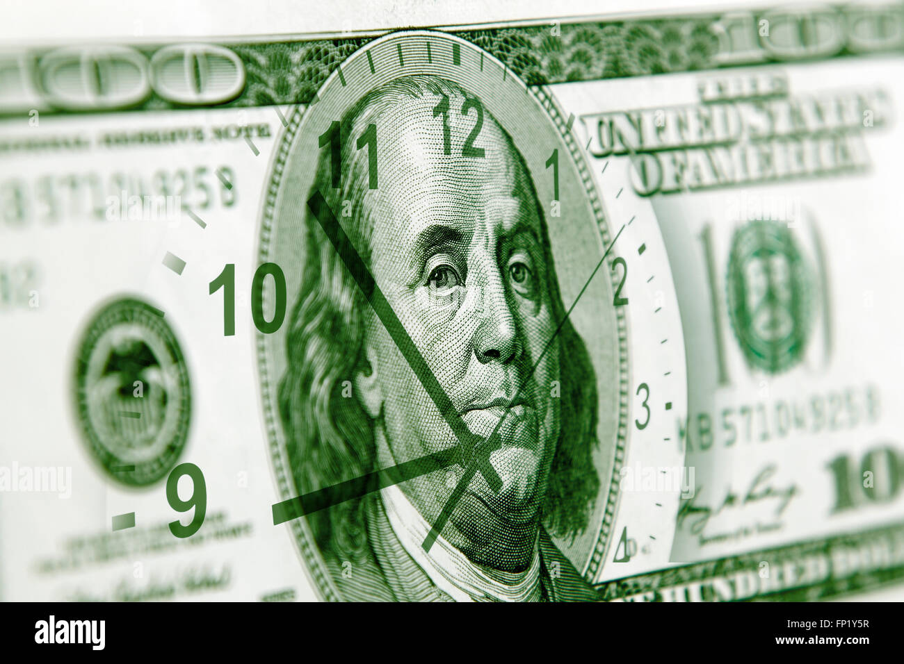 Orologio e American banconota Foto Stock