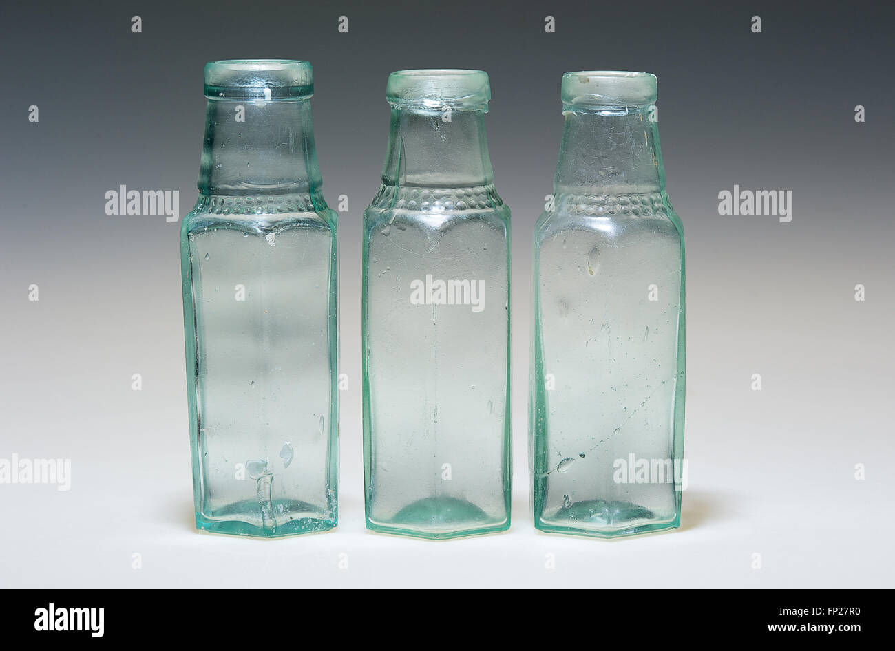 Square bottiglia di vetro Foto Stock