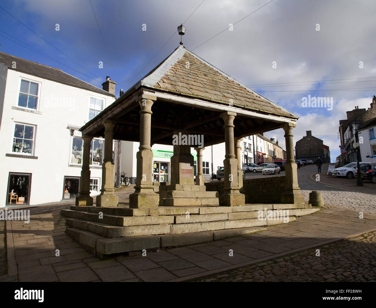 La croce di mercato a Alston, Cumbria. Foto Stock