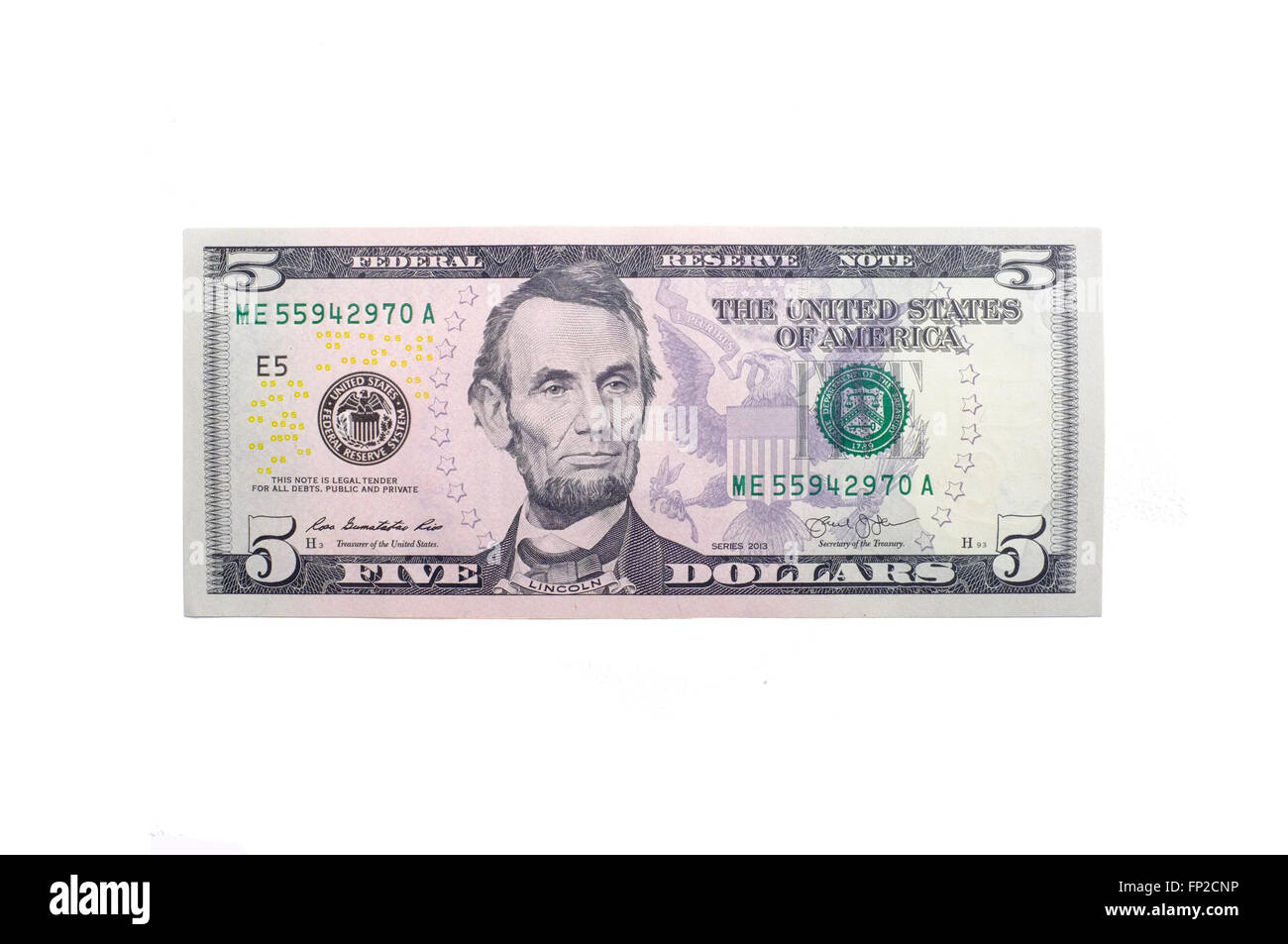 Un singolo American cinque dollar nota fotografati contro uno sfondo bianco Foto Stock