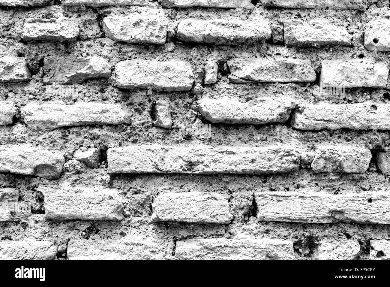 Vista orizzontale di un rustico in bianco e nero la parete in mattoni Foto Stock