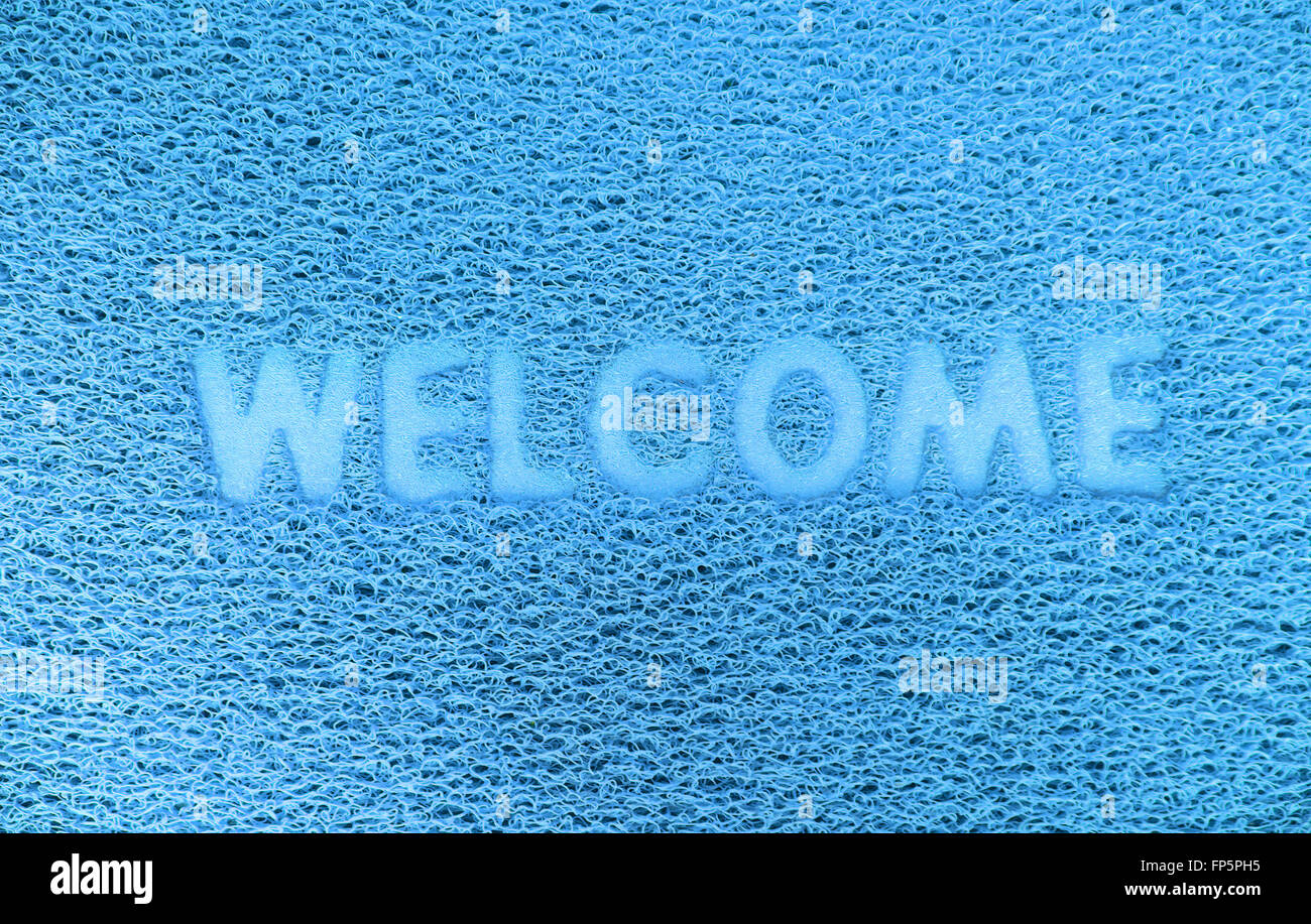 Benvenuti in plastica porta rossa capet texture dello sfondo. Foto Stock