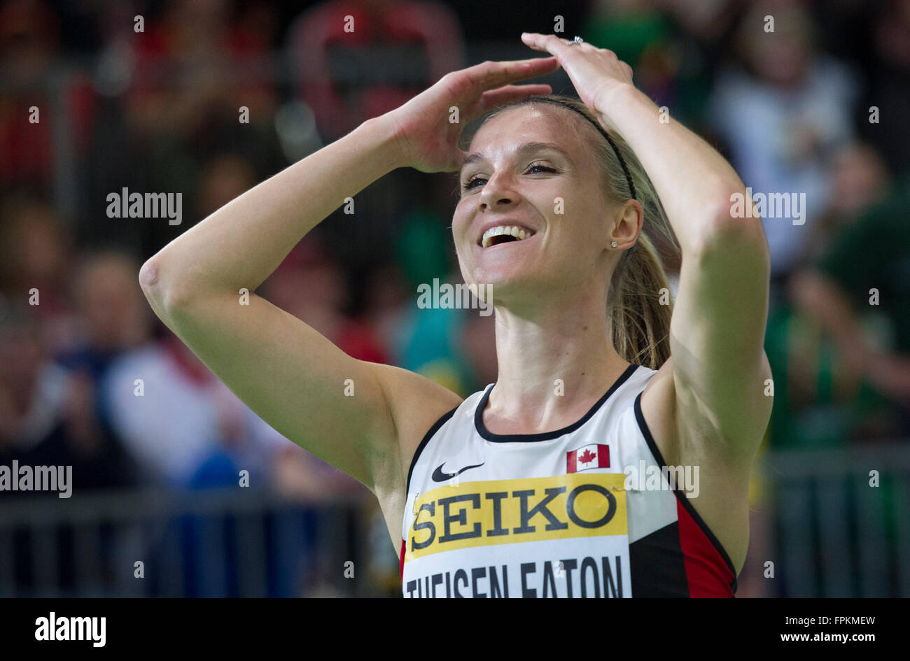 Portland, Stati Uniti d'America. Xviii Mar, 2016. Brianne Theisen Eaton del Canada celebra dopo che ella ha vinto la donna 800 metri di sprint del pentathlon e il pentathlon globale evento, il giorno due di la IAAF Campionati mondiali Indoor presso la Oregon Convention Center a Portland, Oregon, Stati Uniti, il 18 marzo 2016. Brianne Theisen Eaton ha vinto il tetle con 4881 punti. Credito: Yang Lei/Xinhua/Alamy Live News Foto Stock