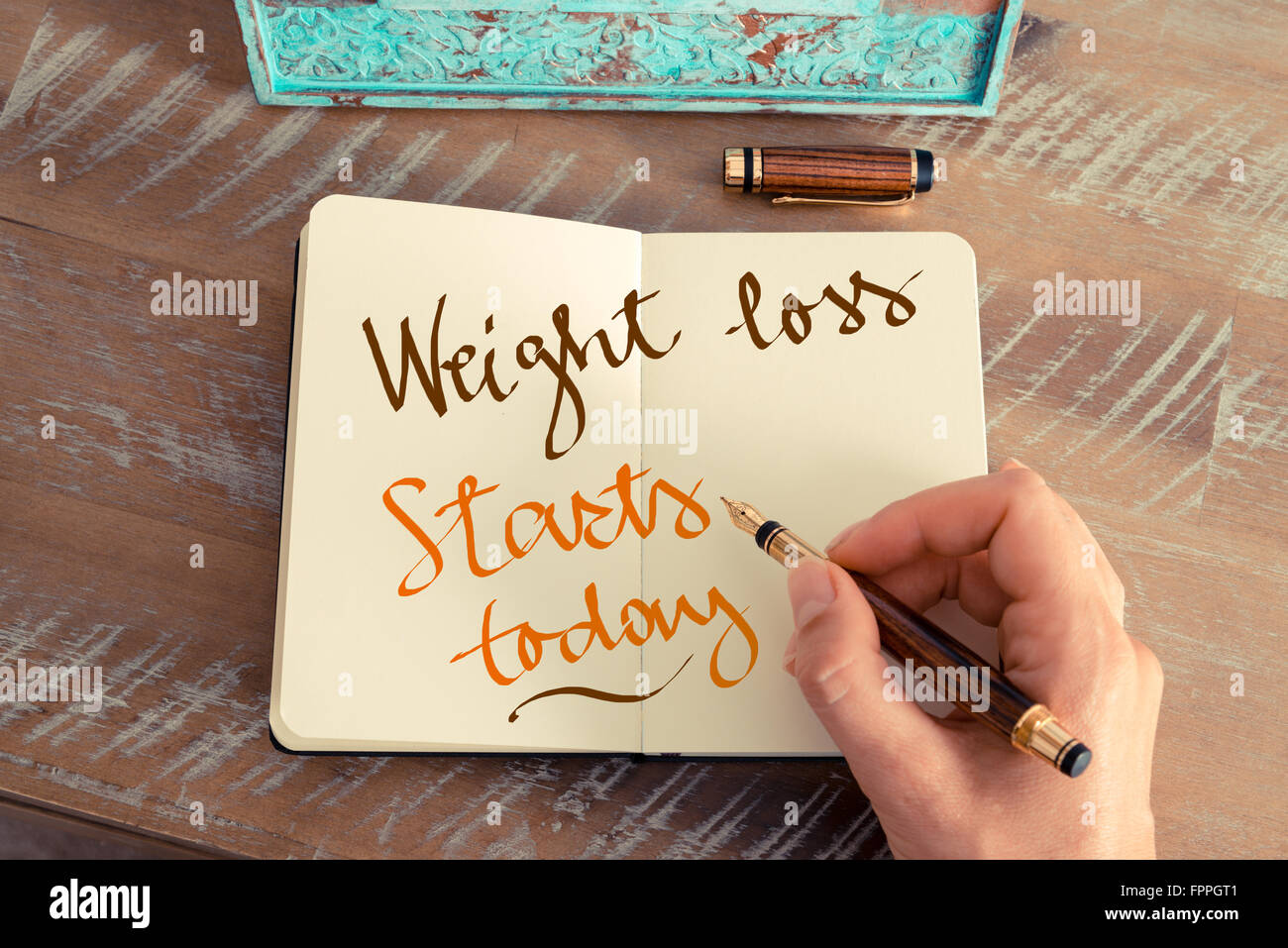Il testo scritto a mano la perdita di peso inizia oggi il concetto di motivazione Foto Stock