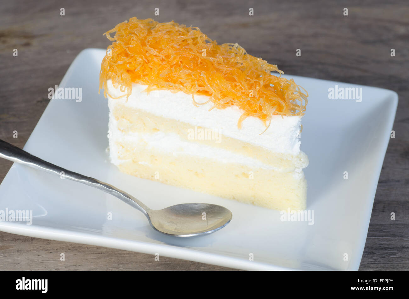 Oro Tuorli filettatura e caffè caldo Foto Stock