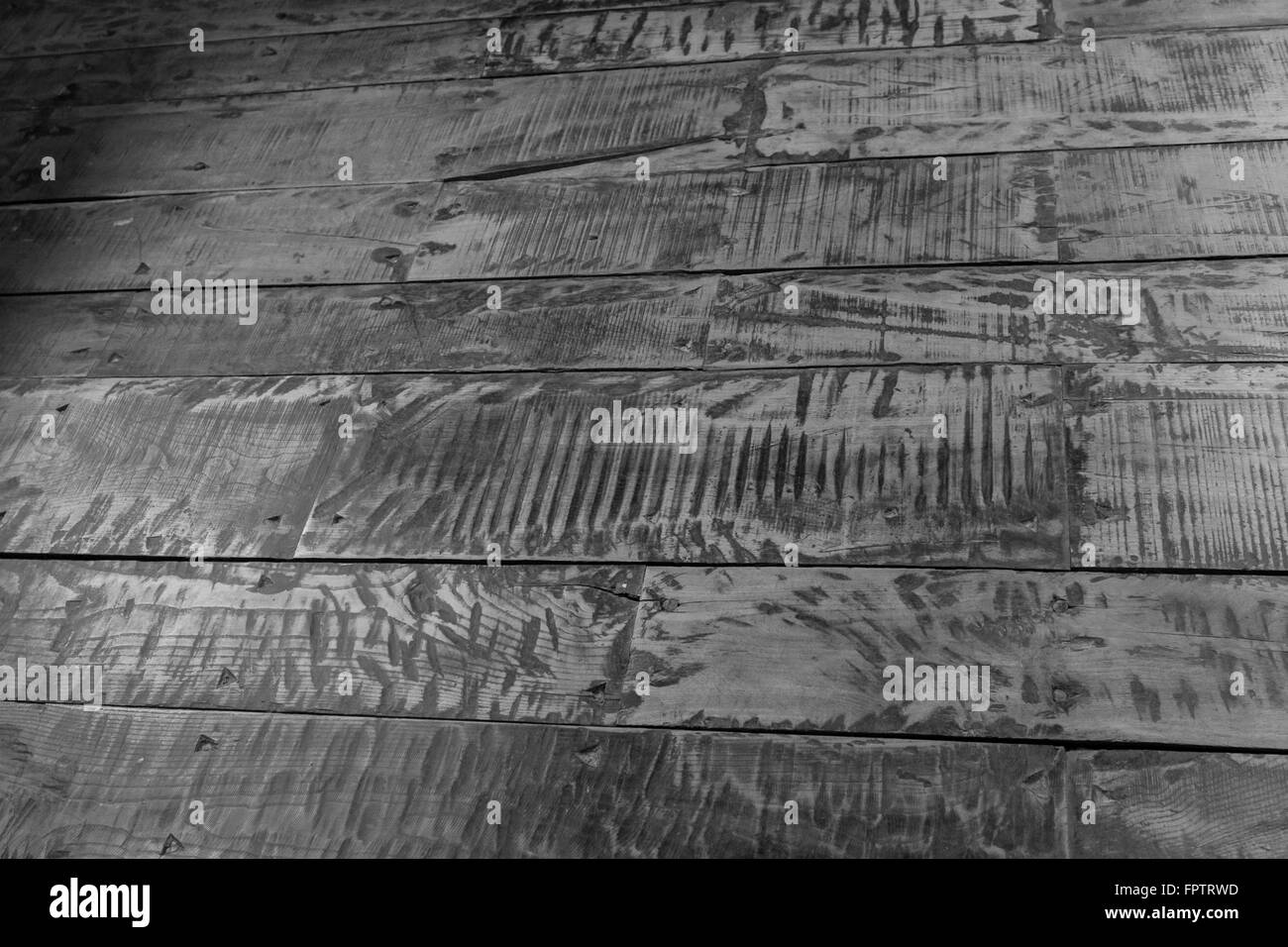 Lo sfondo con il vecchio pavimento di assi in bianco e nero Foto Stock