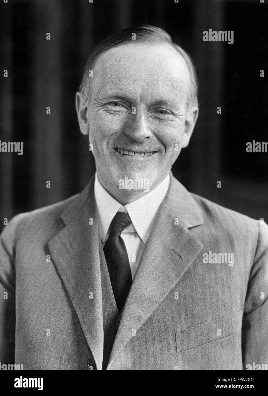 1920s 1930 sorridente ritratto di Calvin Coolidge trentesimo presidente americano guardando la fotocamera Foto Stock