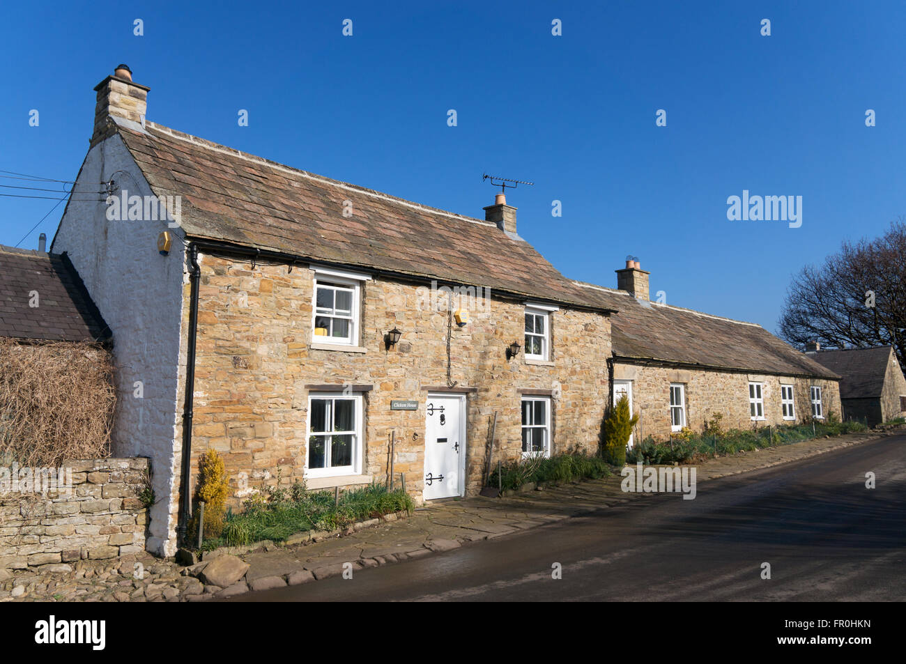 Casa Clickem, un tradizionale cottage in pietra a Whitley Cappella in Northumberland, England, Regno Unito Foto Stock