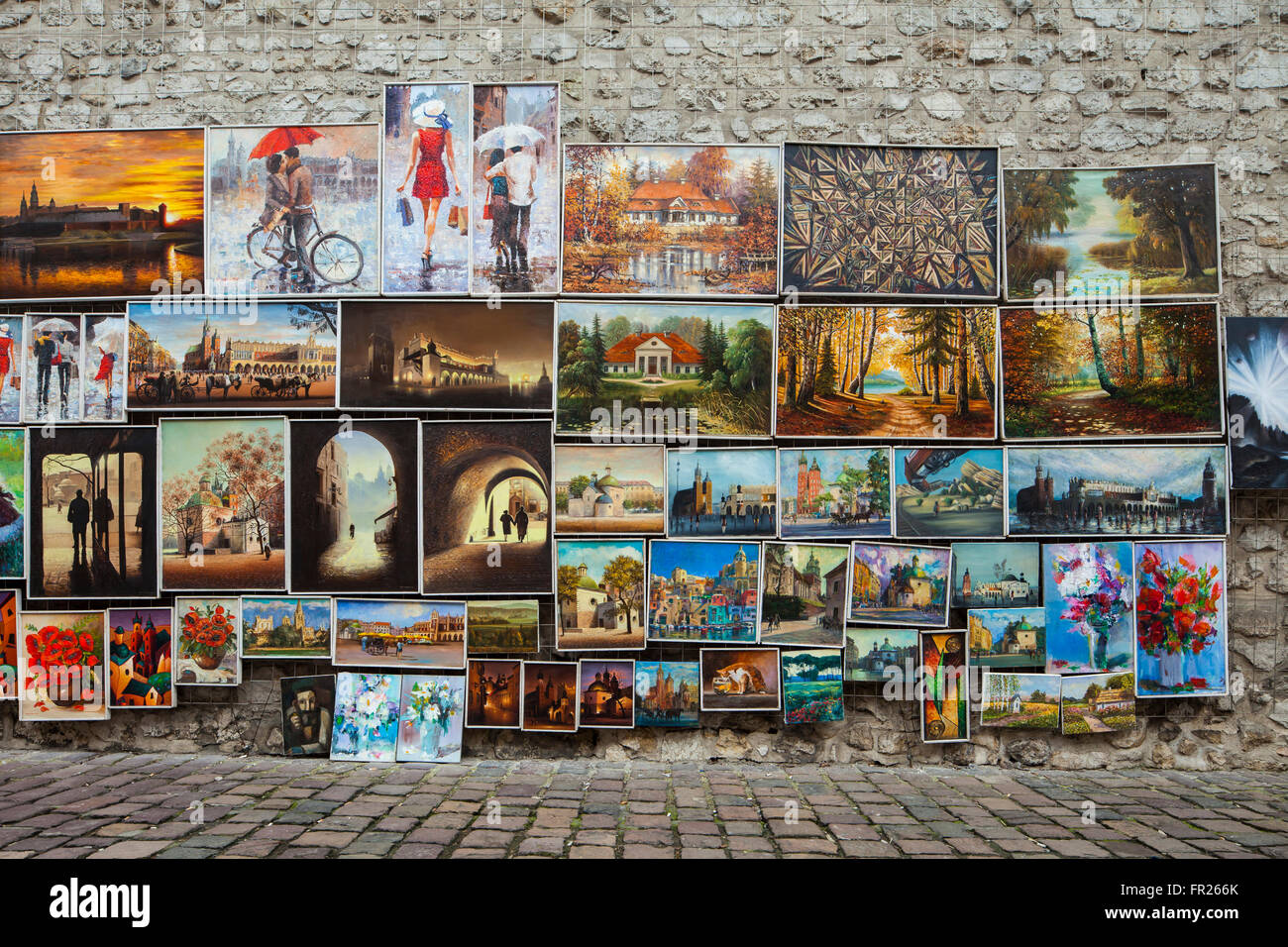 Arte di strada nella citta' vecchia di Cracovia, in Polonia. Foto Stock