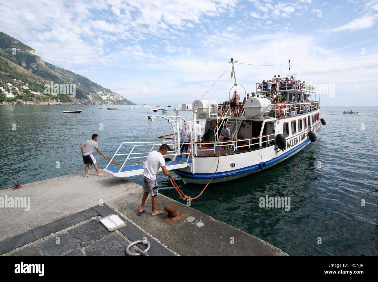 I passeggeri che arrivano in barca Foto Stock