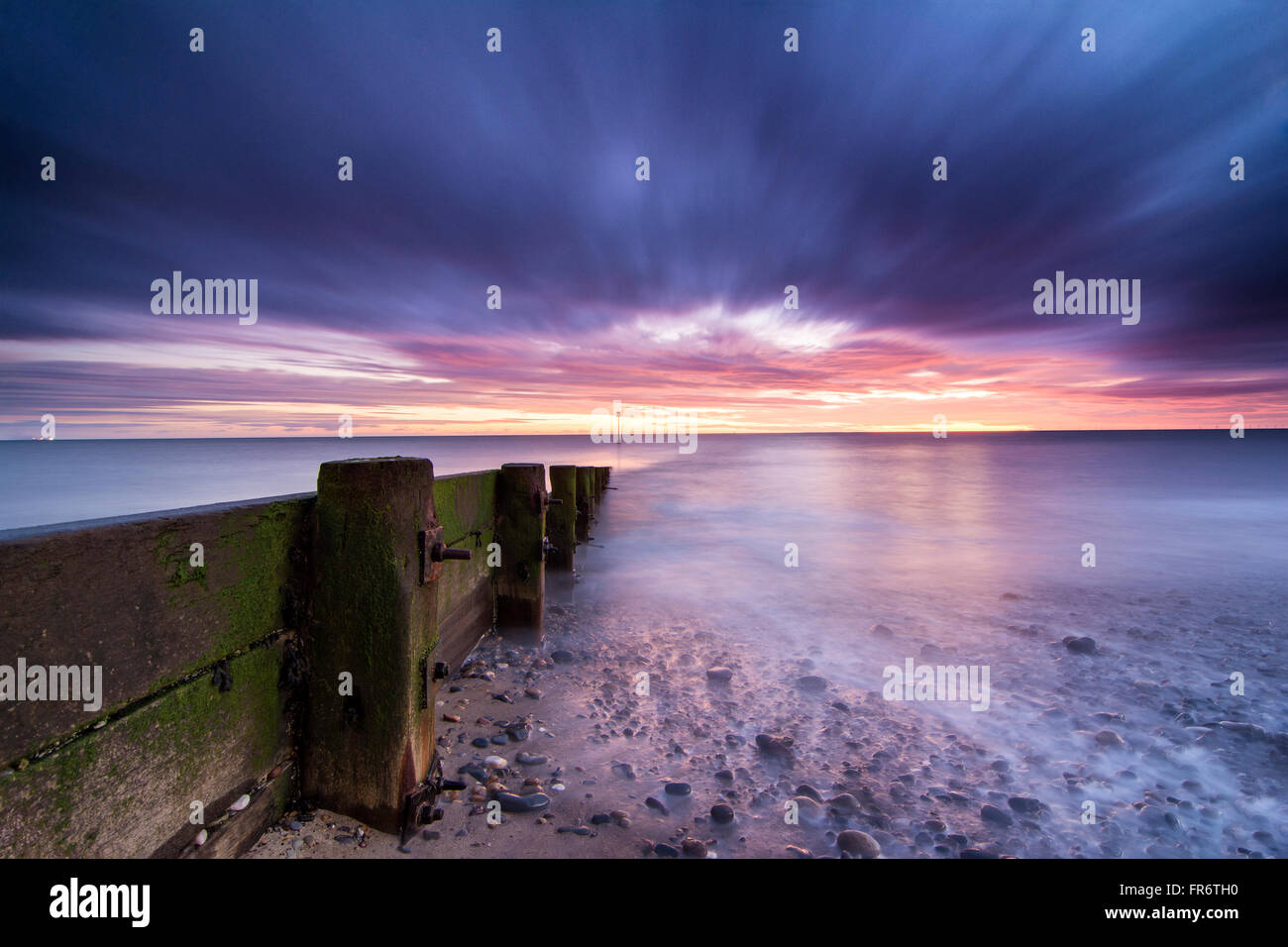 Sunrise a Hornsea beach, East Yorkshire. Foto Stock