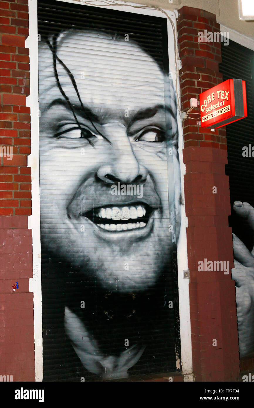 Graffity/ Wandgemaelde mit Jack Nicholson in einer Szene aus dem Spielfilm shining, Berlino. Foto Stock