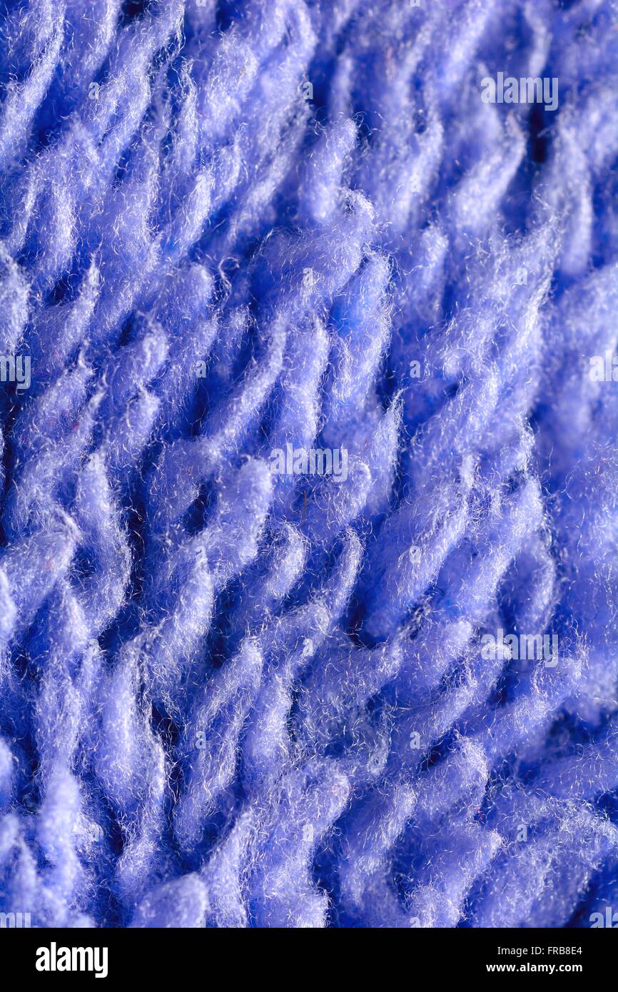 Macro estreme di blu e di fibre tessili. Struttura in fibra.struttura tessile. Foto Stock