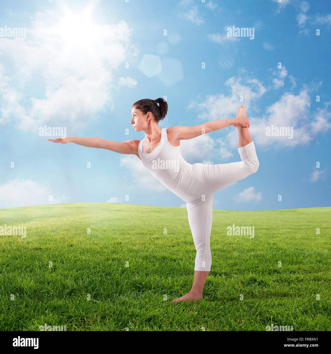 Pilates sul prato Foto Stock