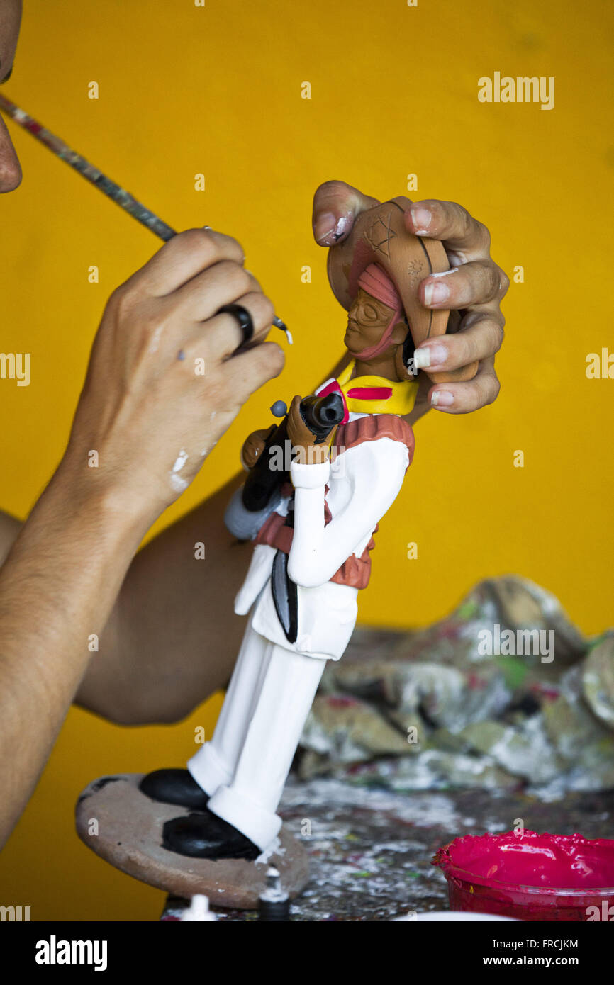 Artesa Pittura scultura in argilla bandit in Alto do Moura quartiere Foto Stock