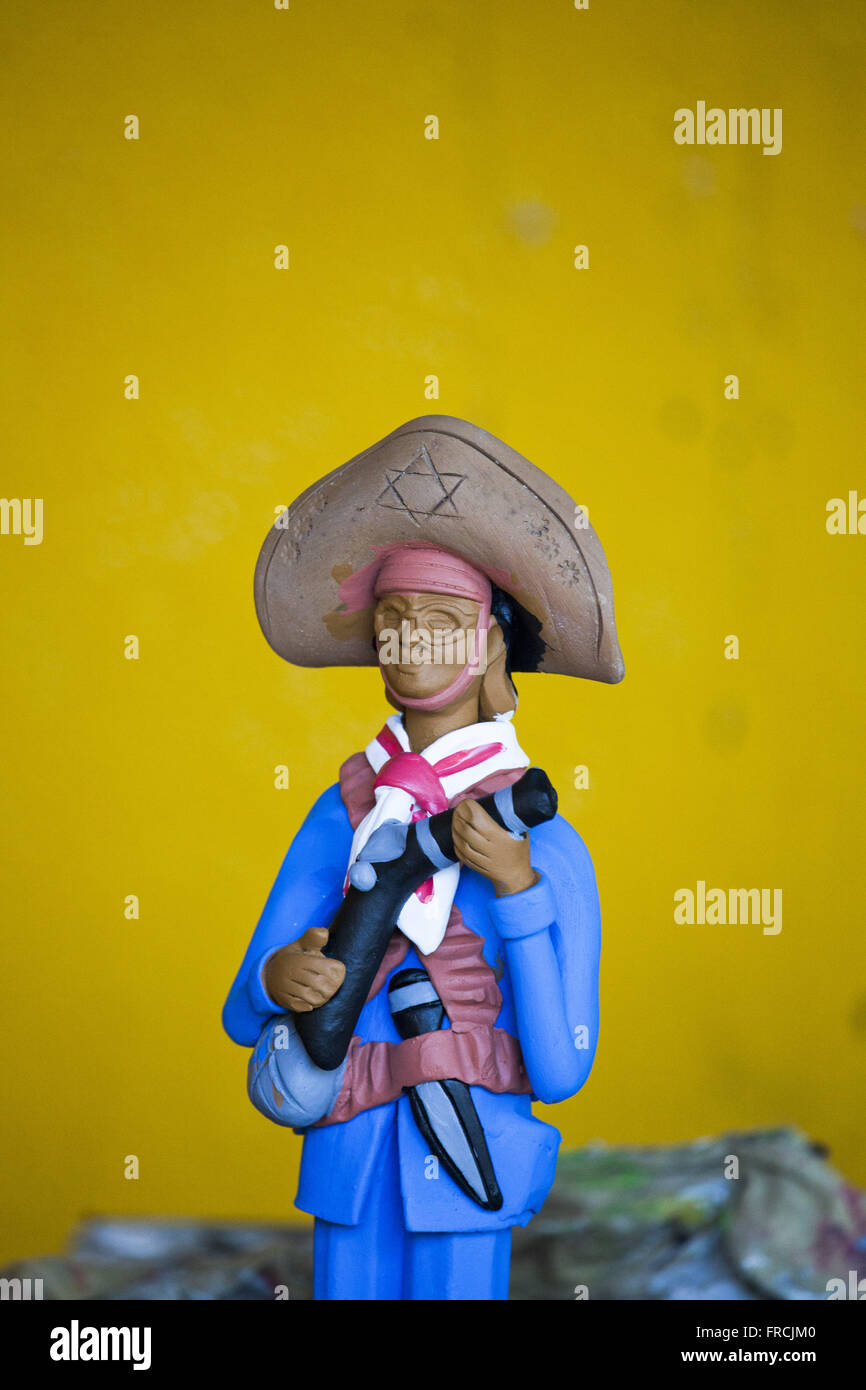 Scultura in argilla di fuorilegge in Alto do Moura quartiere Foto Stock