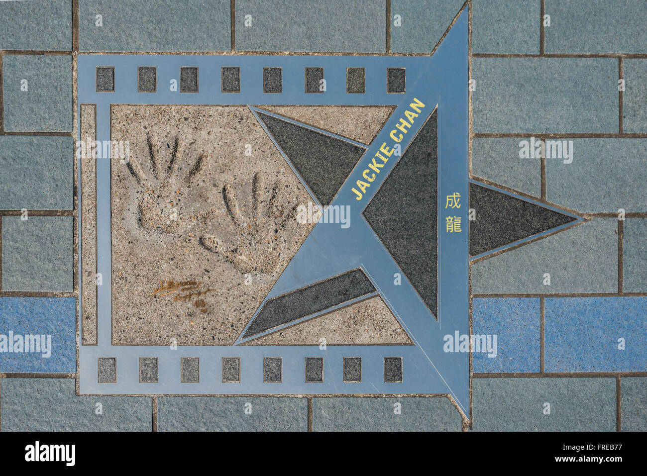 Jackie Chan stella a Avenue of Stars e Tsim Sha Tsui in Kowloon Hong Kong Foto Stock