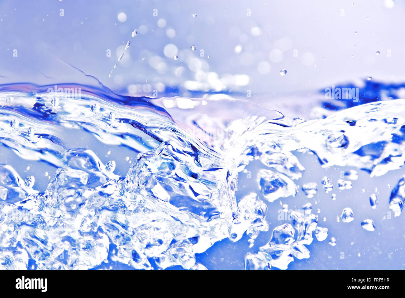 Blue isolato acqua splash bubles strega. Immagine astratta. Foto Stock