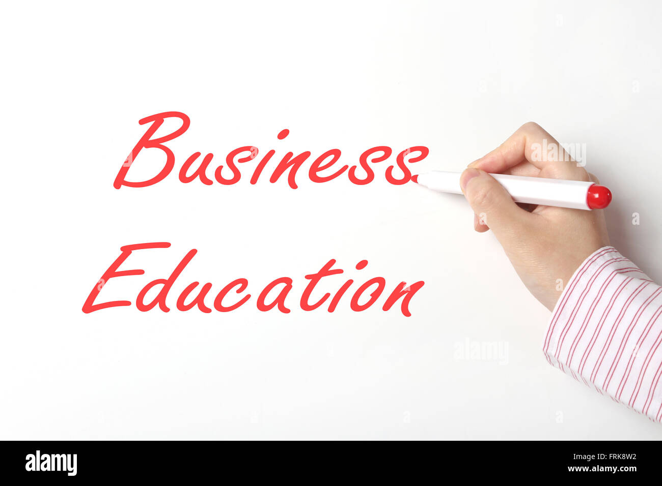Business donna iscritto business education parola su whiteboard Foto Stock