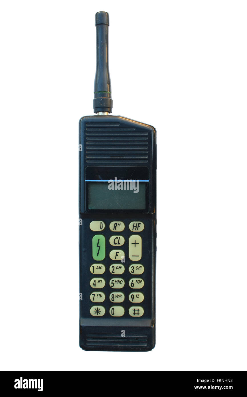 Vecchio telefono cellulare isolato su sfondo bianco Foto Stock