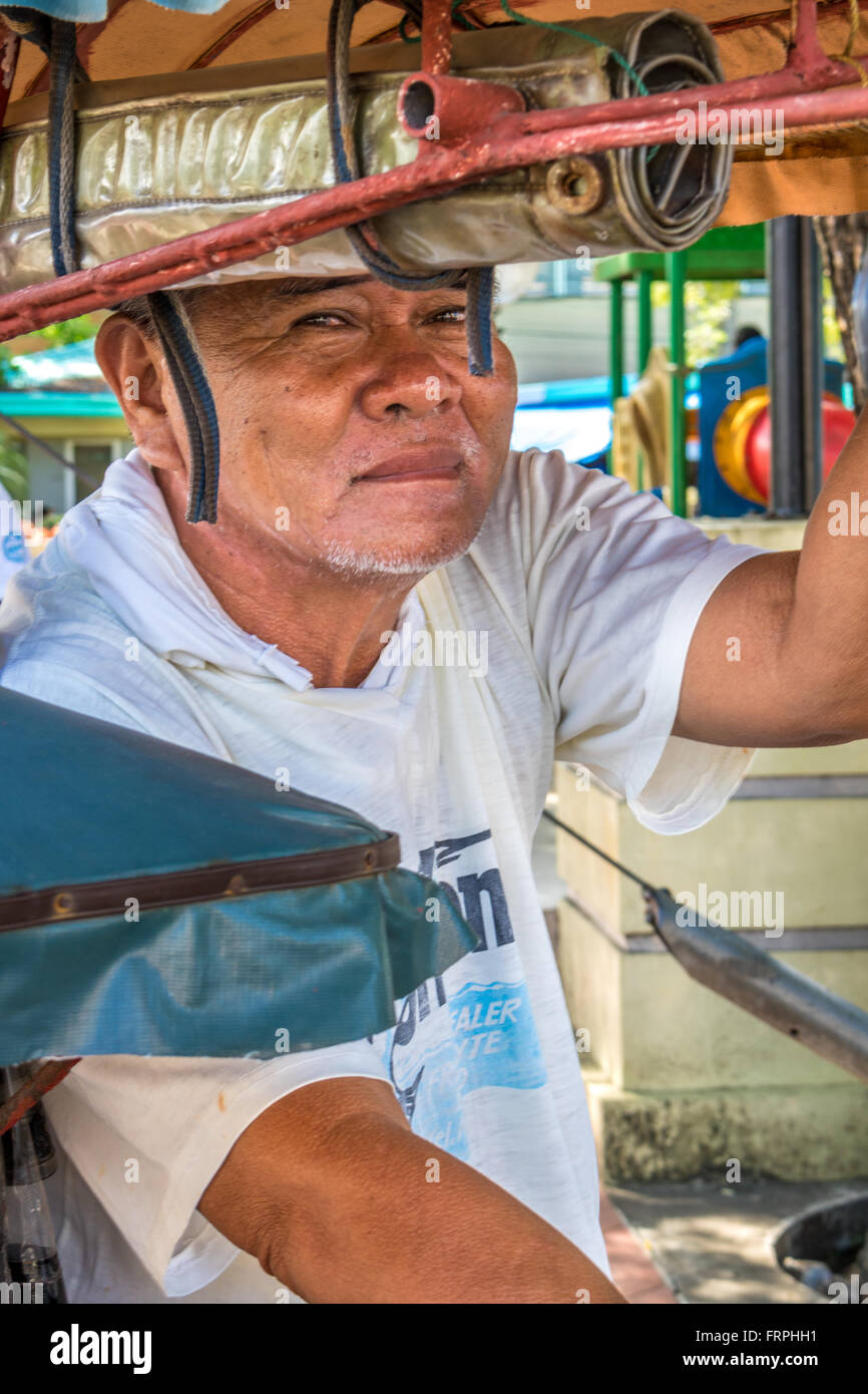 Filippine Leyte Baybay Trishaws noto come Pot-Pot piloti Adrian Baker Foto Stock