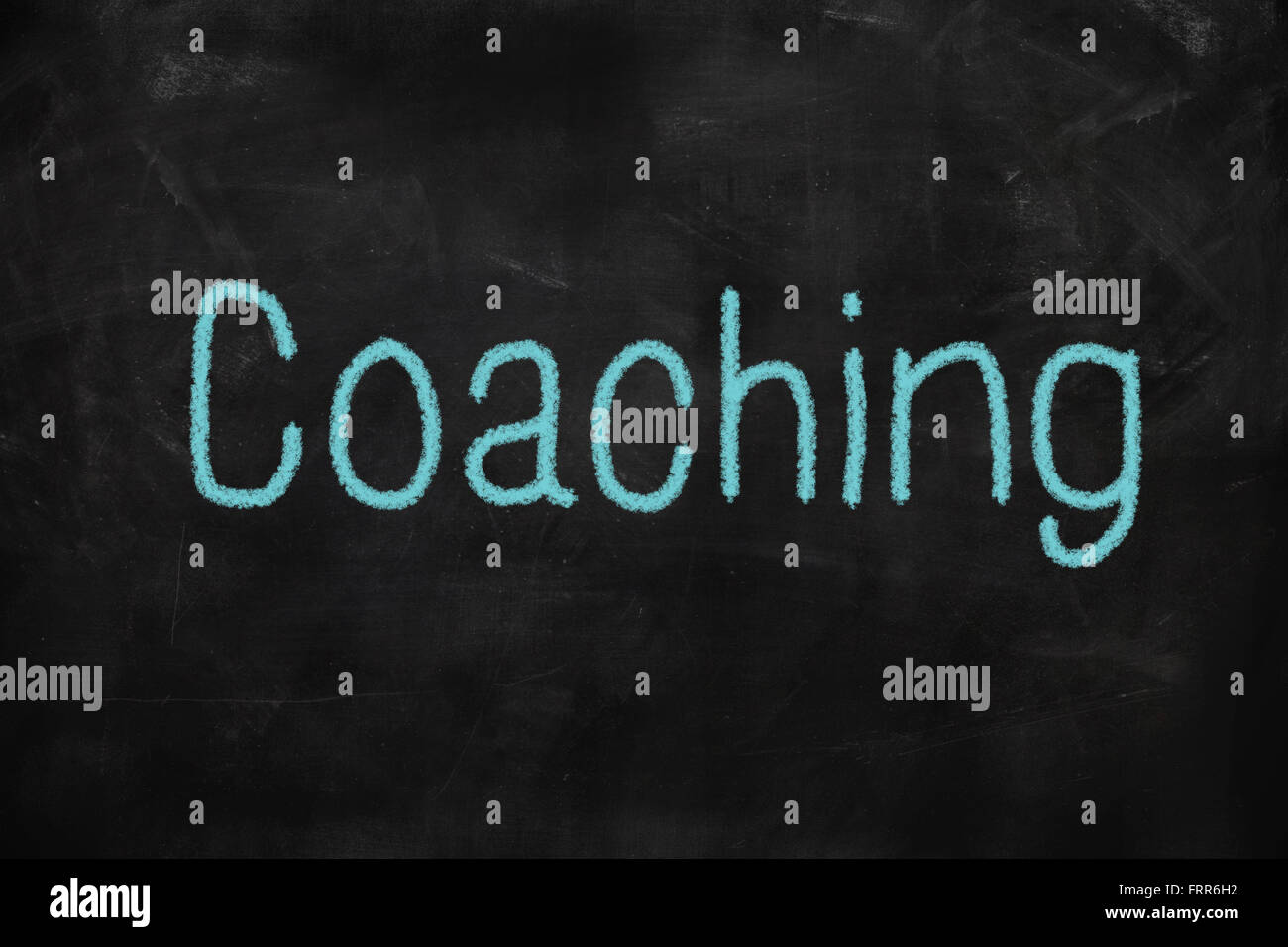 Coaching parola scritta su una lavagna con gesso Foto Stock
