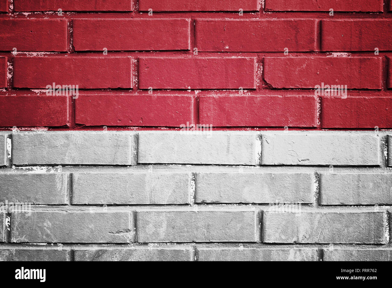 Bandiera dell'Indonesia sul muro di mattoni Foto Stock Bandiera dell'Indonesia sul muro di mattoni Foto Stock