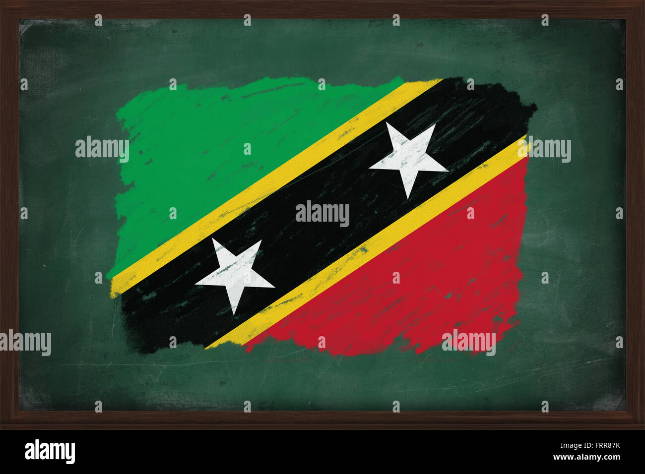Saint Kitts e Nevis bandiera dipinta con colori gesso sulla vecchia blackboard Foto Stock