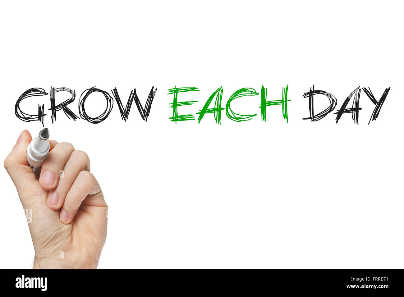 La scrittura a mano crescere ogni giorno su una lavagna bianca Foto Stock