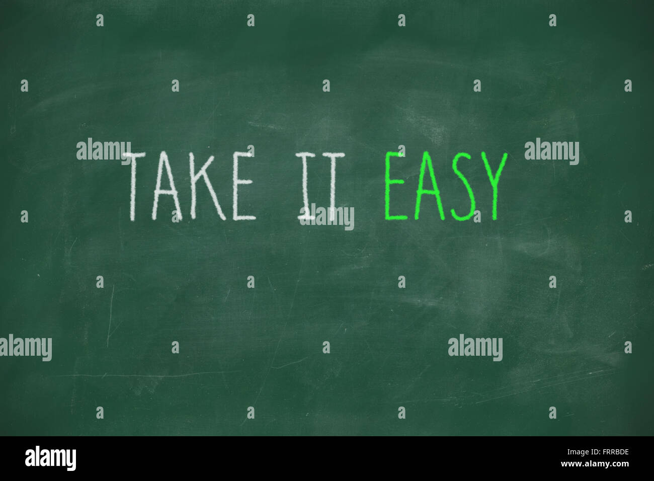 Take it easy manoscritta su scuola di Blackboard Foto Stock