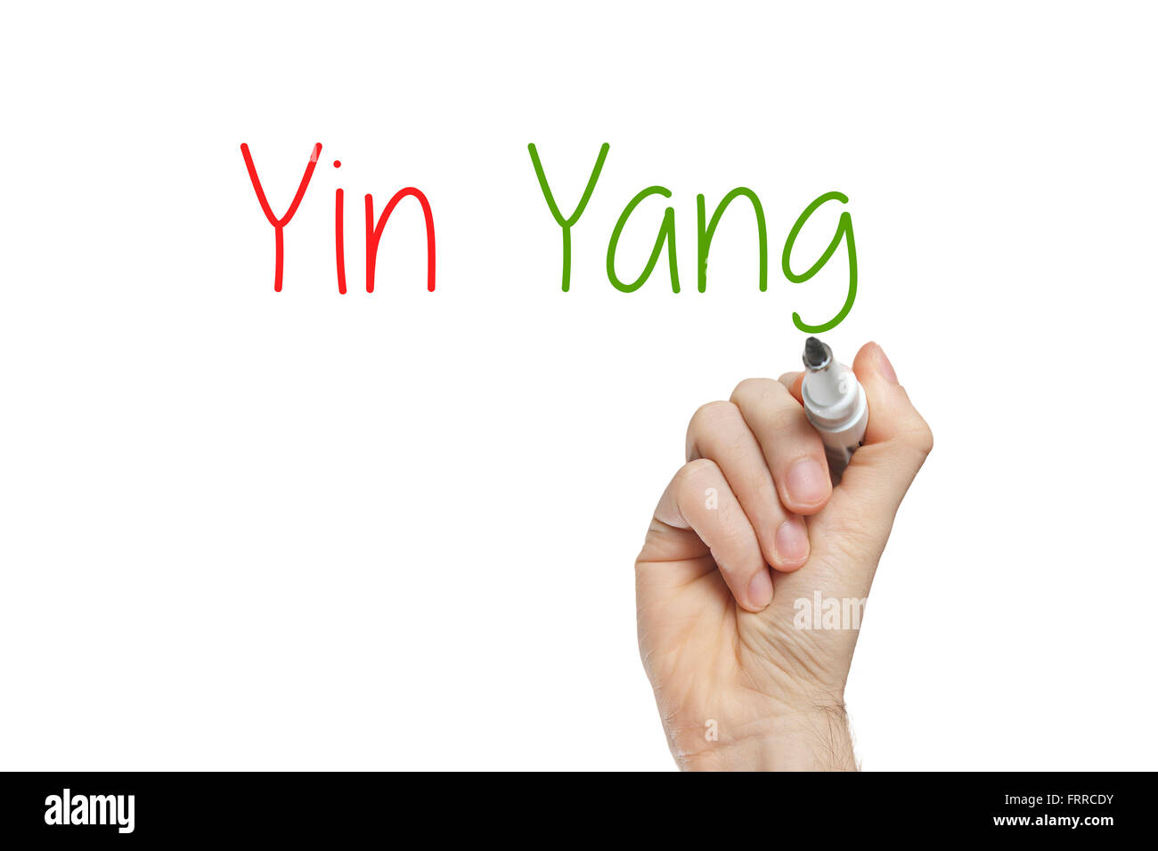 La scrittura a mano yin yang su una lavagna bianca Foto Stock