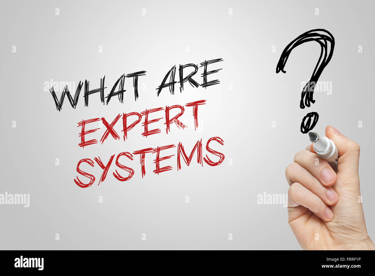 La scrittura a mano che cosa sono i sistemi esperti su sfondo grigio Foto Stock
