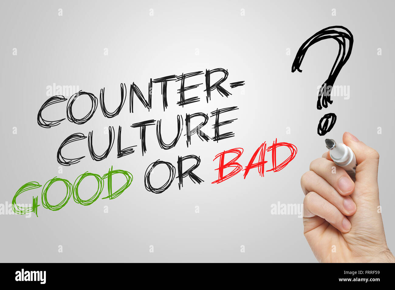 La scrittura a mano controcultura buono o cattivo su sfondo grigio Foto Stock