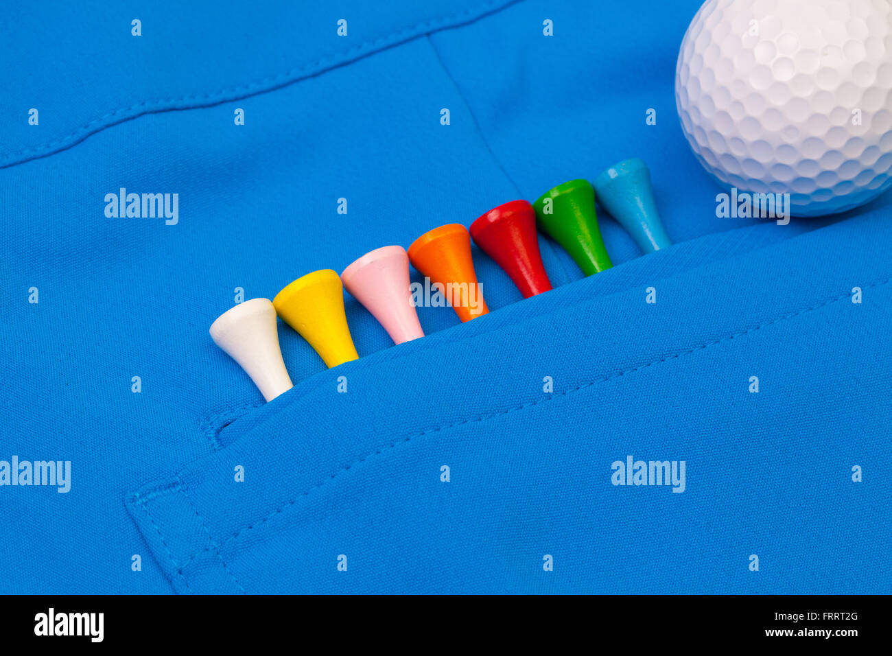 Dettaglio dei pantaloni blu e attrezzature da golf Foto Stock