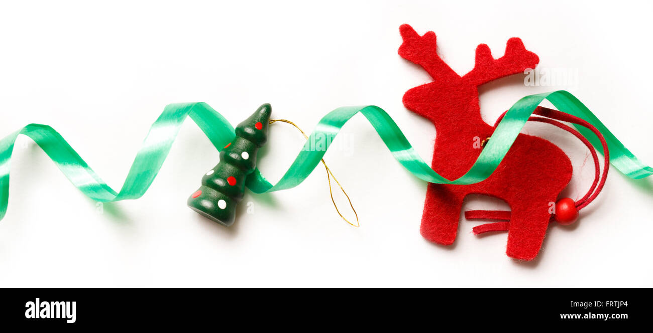 Xmas sfondo rosso con le renne e il nastro di inchiostro Foto Stock