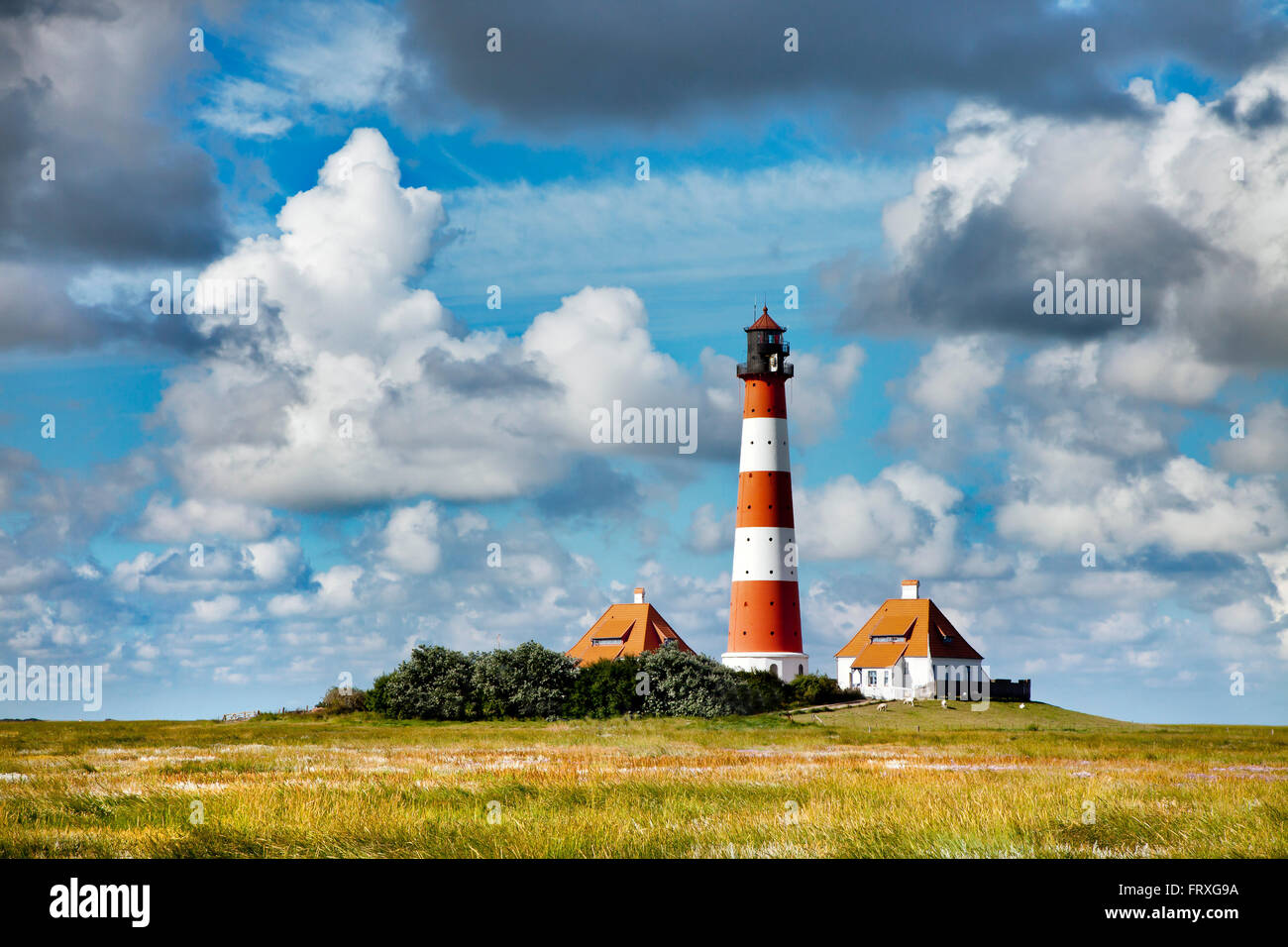 Faro Westerhever, penisola di Eiderstedt, costa del Mare del Nord, Frisia settentrionale, Schleswig-Holstein, Germania Foto Stock Faro Westerhever, penisola di Eiderstedt, costa del Mare del Nord, Frisia settentrionale, Schleswig-Holstein, Germania Foto Stock