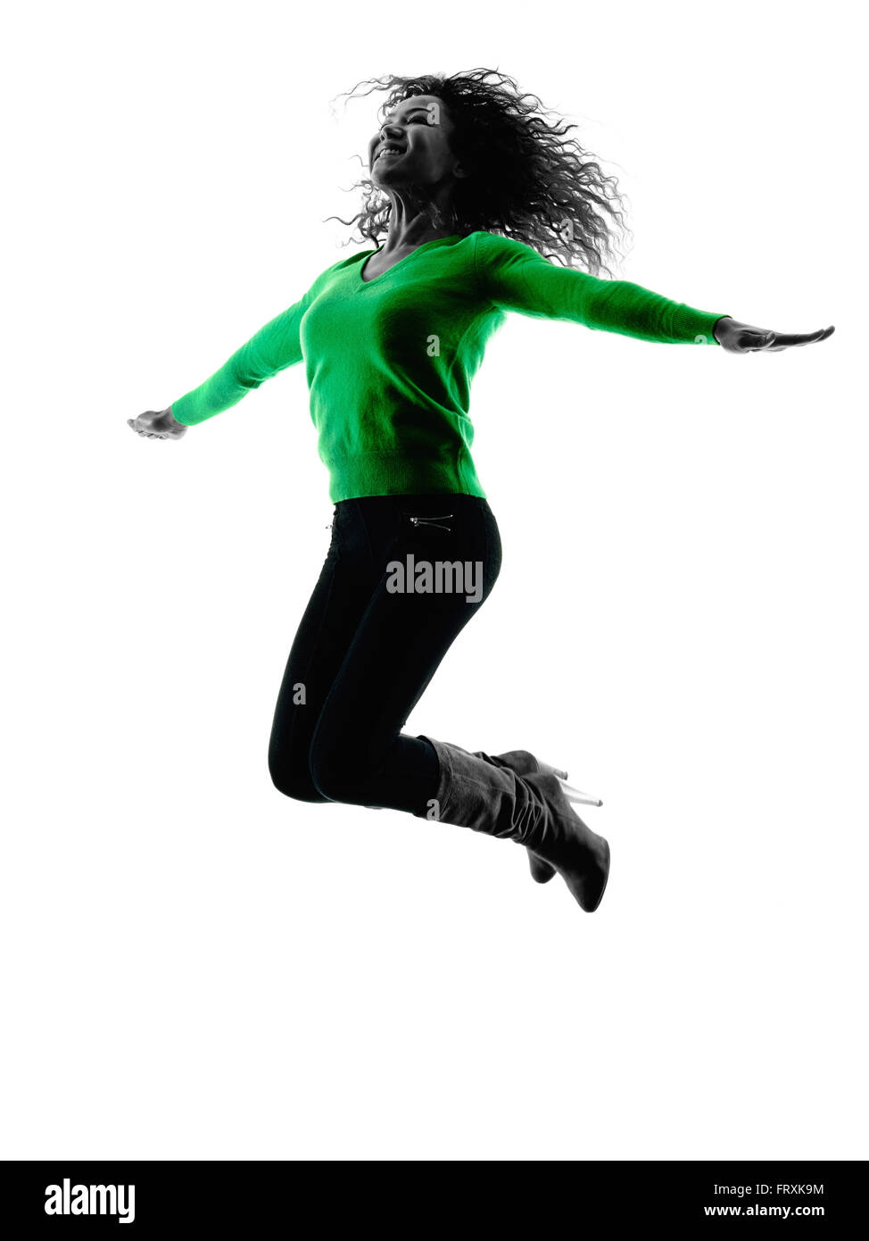 Una razza mista giovane donna jumping happy silhouette isolati su sfondo bianco Foto Stock