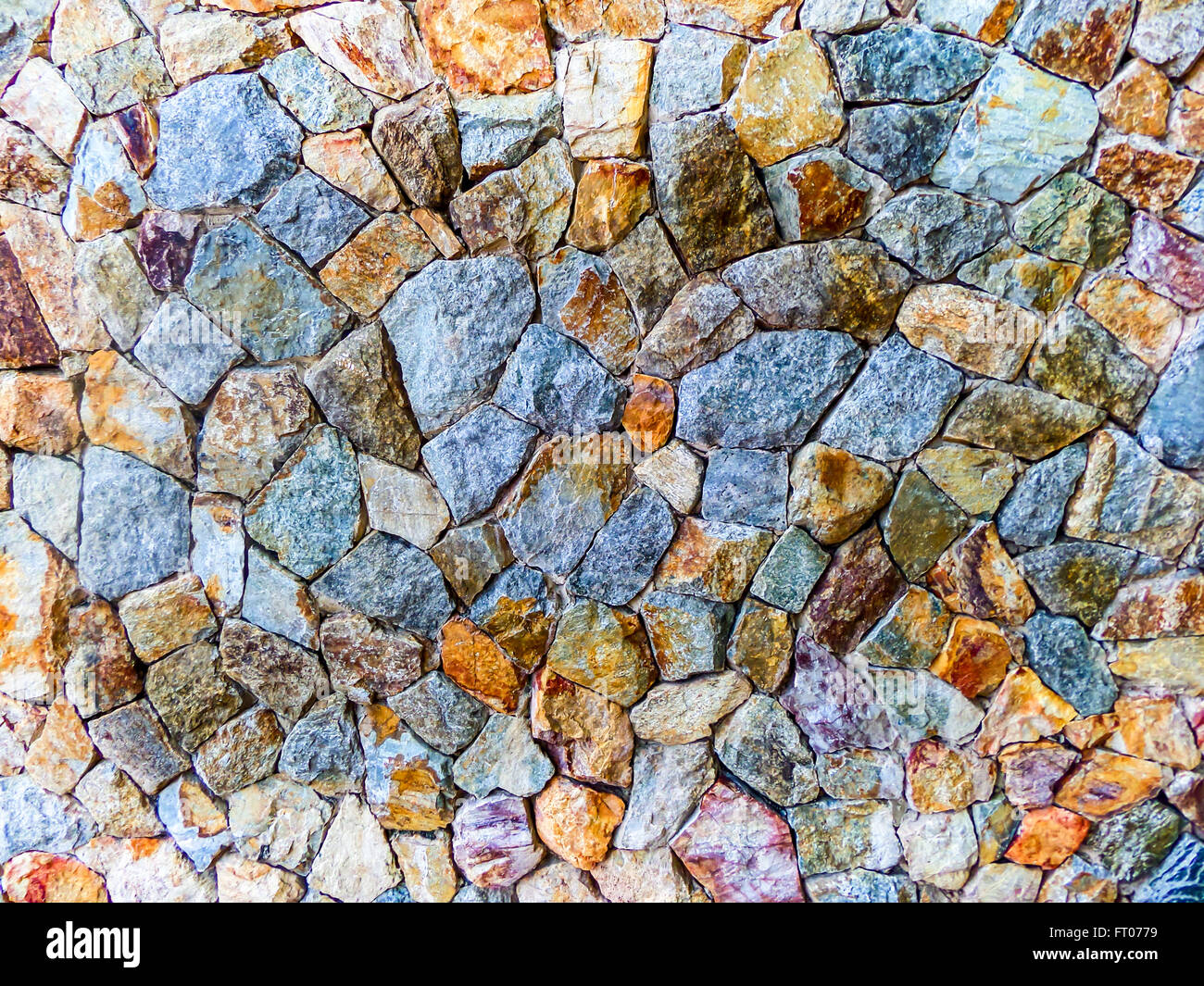 Il granito muro di pietra molto dura tipo di roccia che è utilizzato nella costruzione di edifici e monumenti Foto Stock