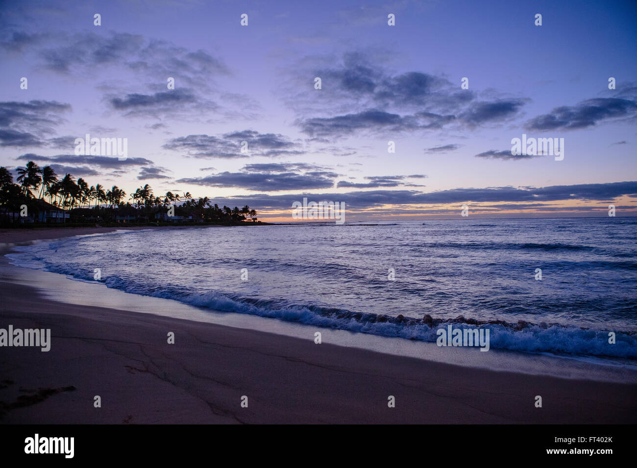 Crepuscolo di Poipu Beach Foto Stock