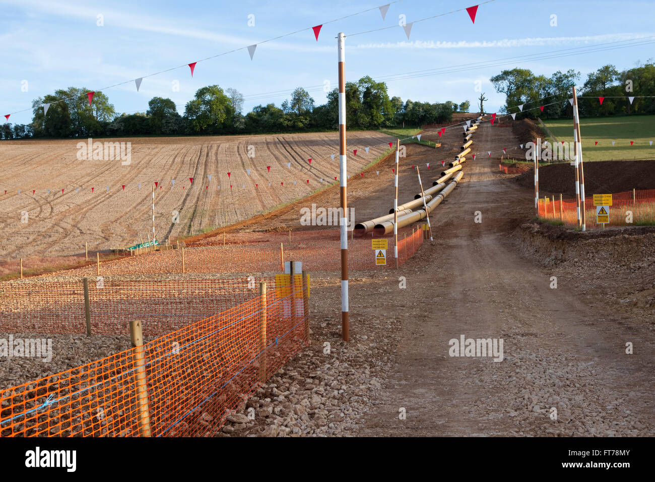 Gli scavi e le pipeleine tagliare tutta la campagna Gloucestreshire per l'installazione di un nuovo gas naturale pipleine da Wormington di Sapperton. Foto Stock