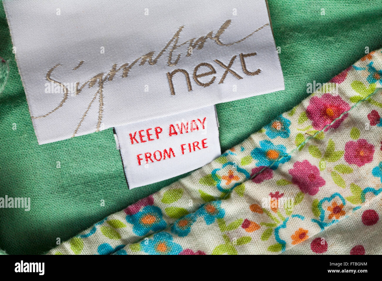 Next keep away from fire label in clothing immagini e fotografie stock ad  alta risoluzione - Alamy