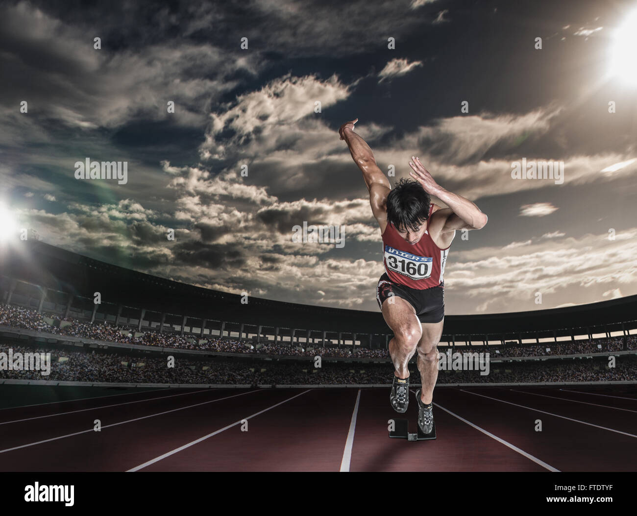 Atleta giapponese in esecuzione su via Foto Stock