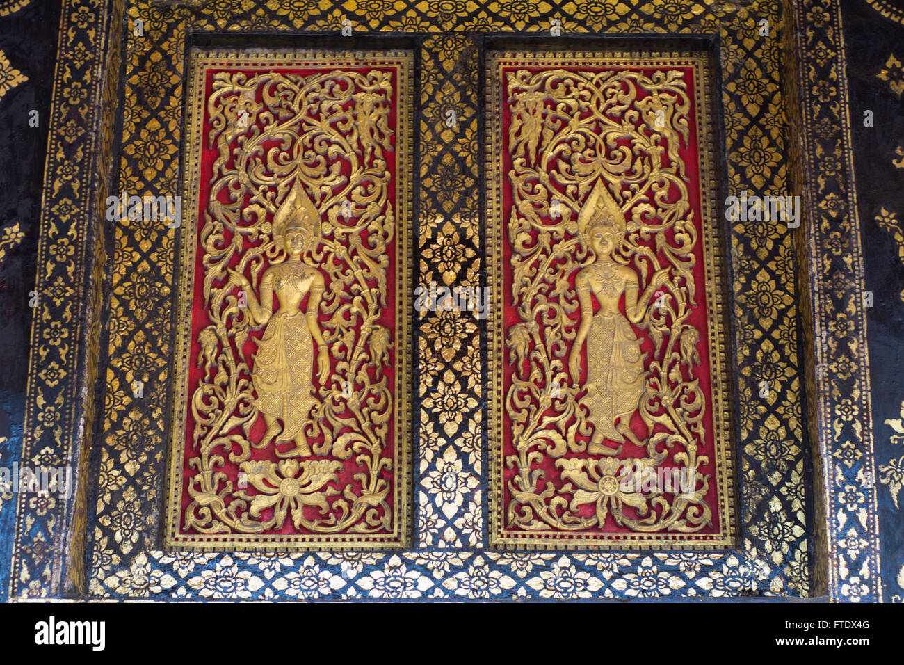 Wat Xieng Thong parete, Luangprabang,Laos Foto Stock