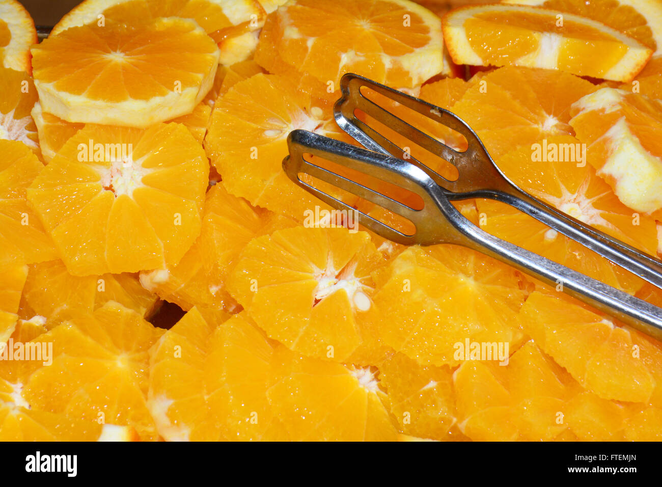 Affettato e arance pelate Foto Stock