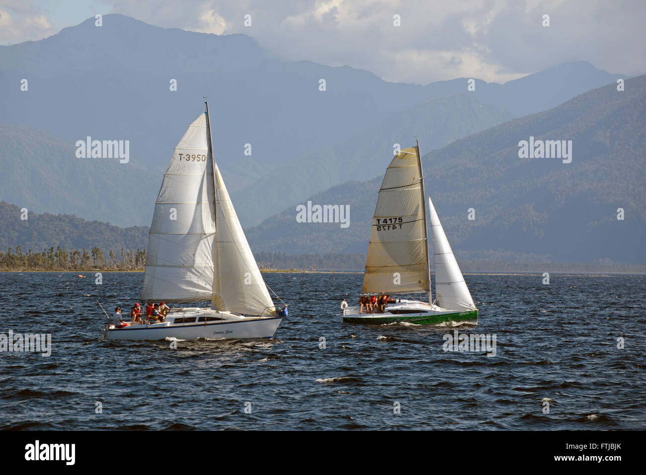 MOANA, Nuova Zelanda, 6 febbraio 2016: barche a vela sul lago di Brunner, 6 febbraio 2016, Nuova Zelanda Foto Stock