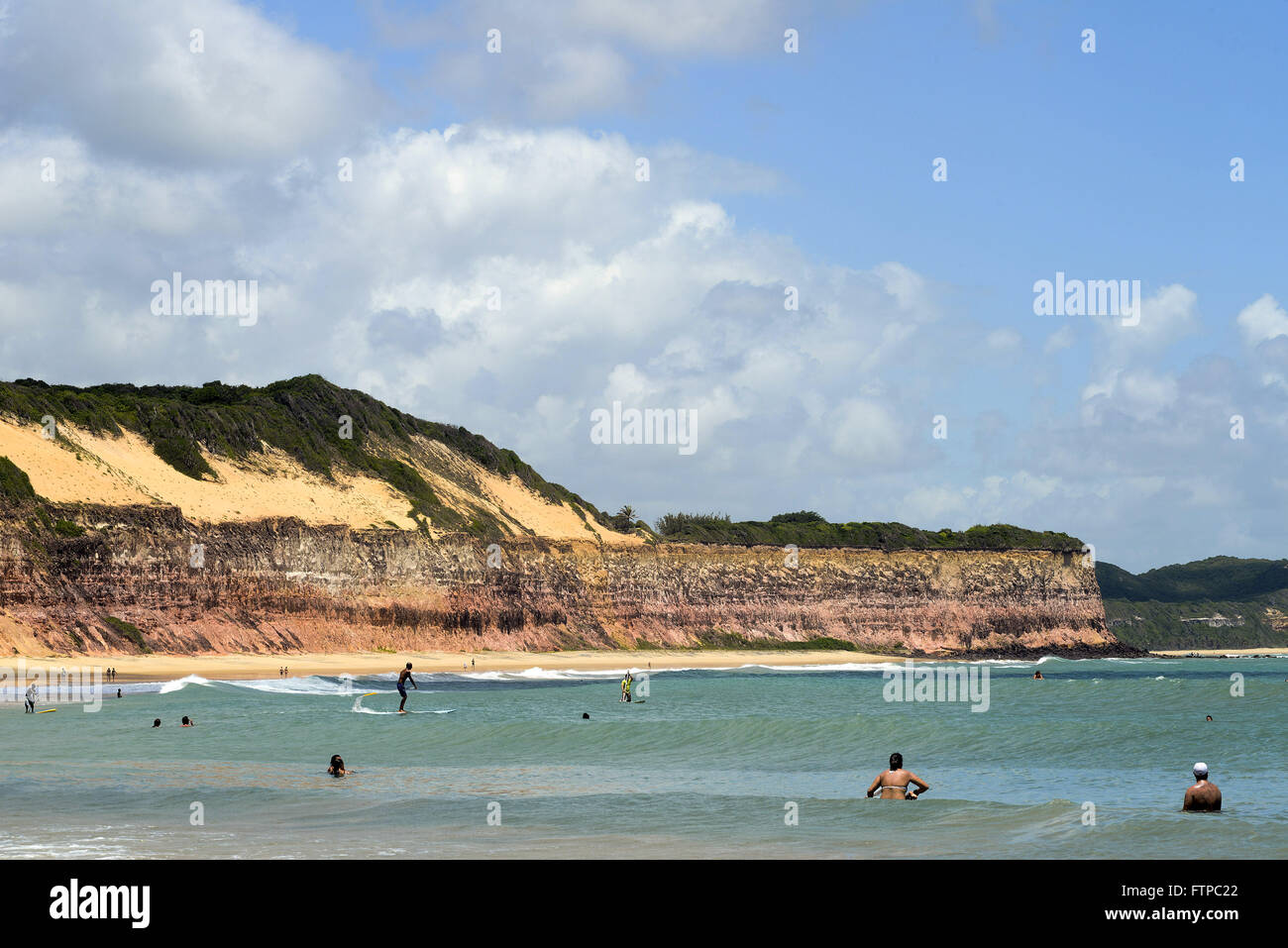 Bagnanti sulla spiaggia Villaggio - Pipa Quartiere Foto Stock